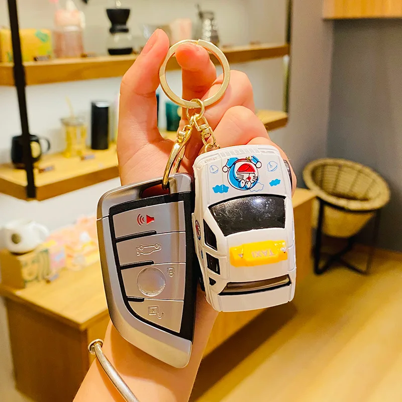 Cartoon car school bus decompression toy keychain toy wholesale