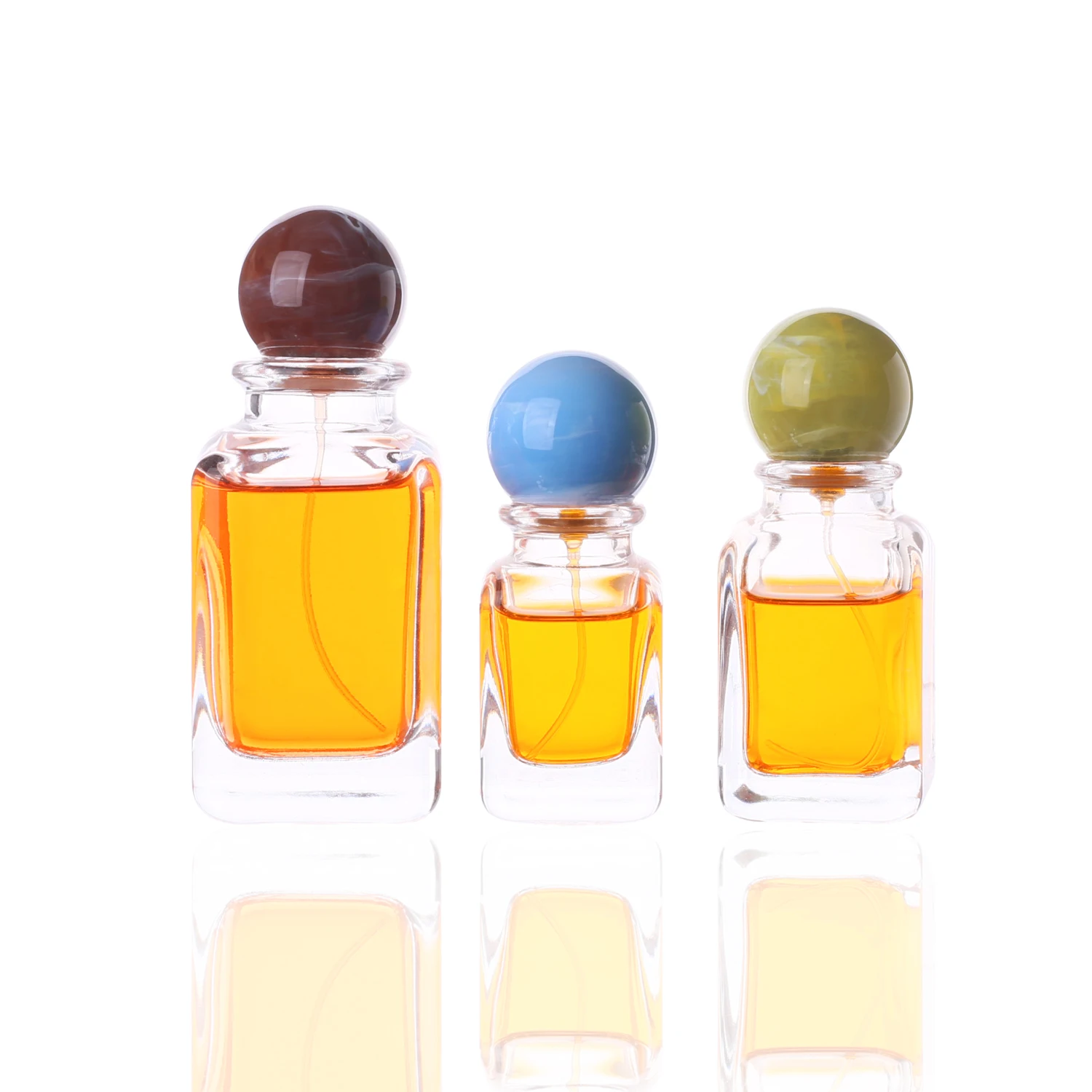 Hot Sale Wholesale Square Unique Shaped 30ml 50ml 100ml  Glass Perfume Bottles with Customized Colored Resin Ball Lids