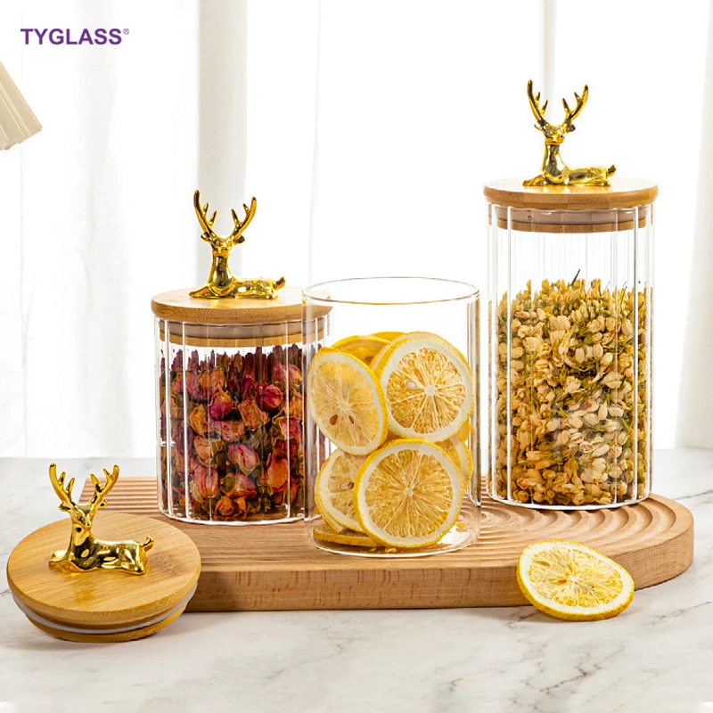 Hot sale High borosilicate large glass pumpkin jars custom stripe glass storage jar with an elk bamboo wooden lids for kitchen