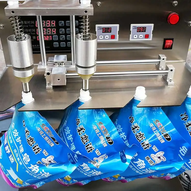 Liquid semi automatic spout pouch filling machine manual stand up bag doy pack filler and capper machines cheap price for sale