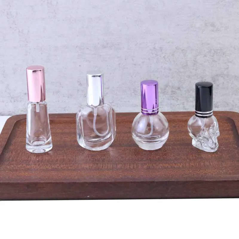 In stock Empty Mini 5ml 10ml Clear Cool Skull Shape Perfume Glass Bottle with Mist Sprayer(GPM20-S)