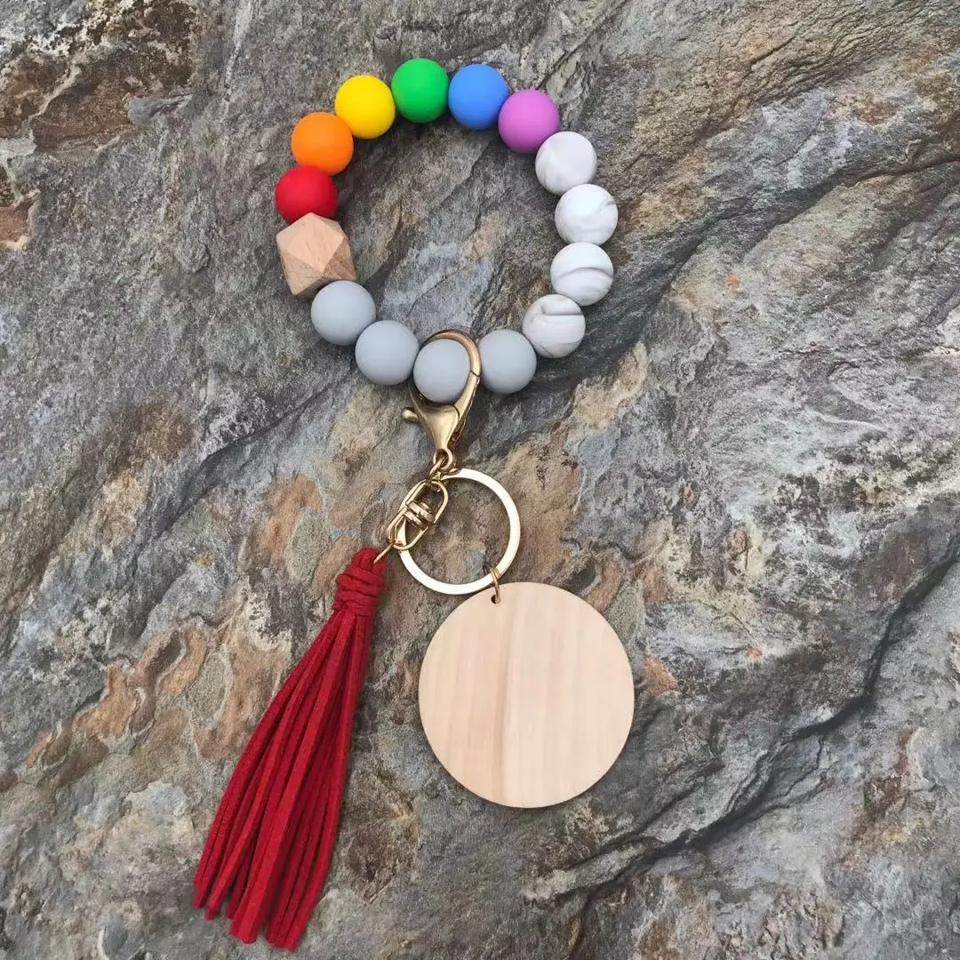 Wholesaler Silicone Bead Bracelet Keychain With A Wooden And Round Wood