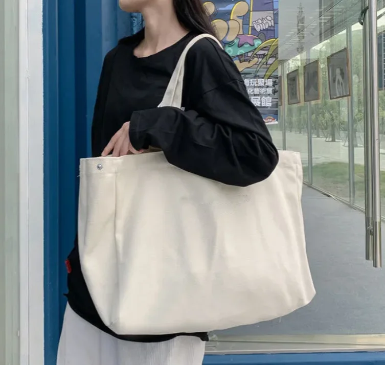 Wholesale Small MOQ black large capacity eco-friendly 12OZ thick reusable cotton custom logo print tote canvas shopping bag