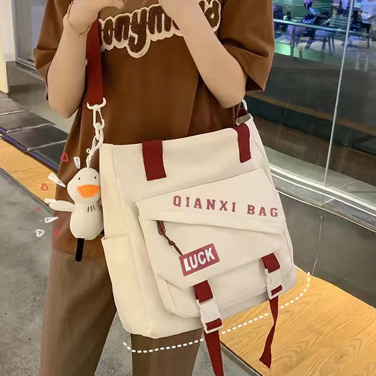 Female lady college student large capacity waterproof University crossbody canvas bag nylon schoolbag one-shoulder handbag girl