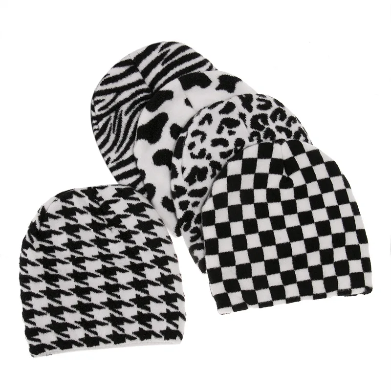 Wholesale custom jacquard beanies cow print cuffless skull beanie winter hat