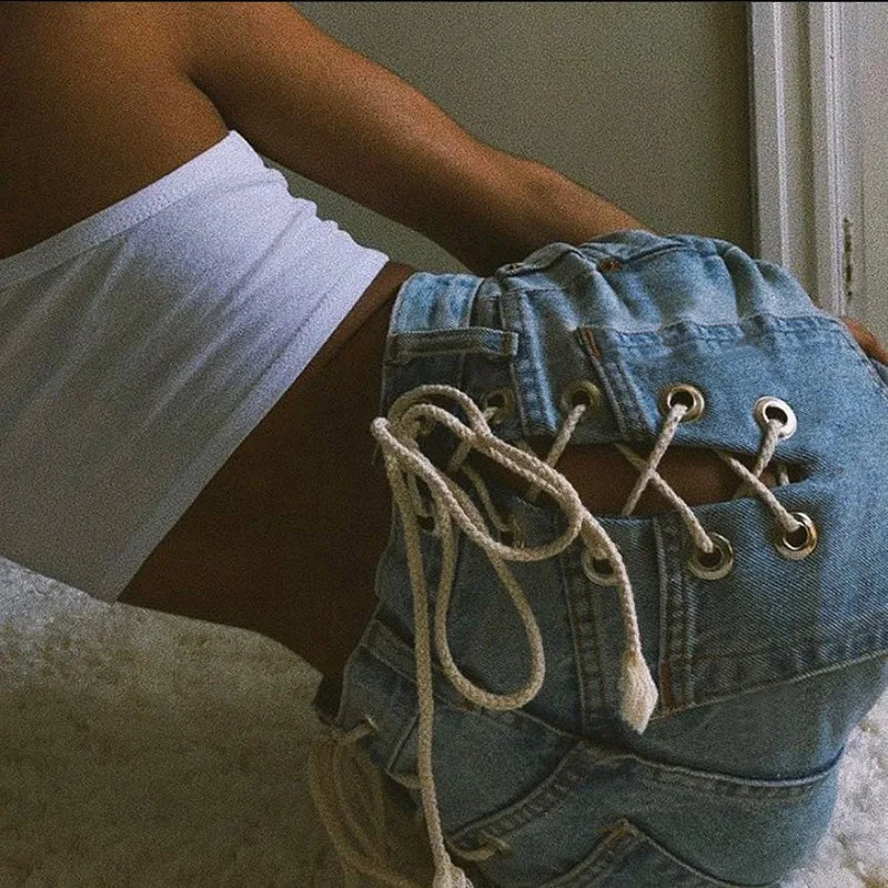 
Hot sales blue long jeans outfits women Manufacture hollow strap lady legging jeans Creative back contrast eyelet denim pants 