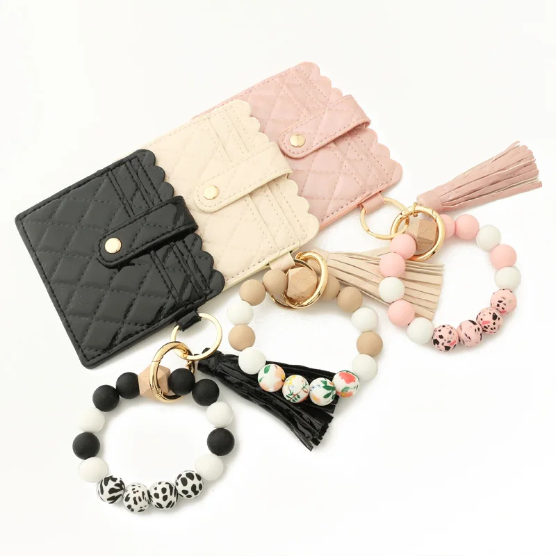 2022 In Stock Silicon Beads Bracelet Keychain Pu Leather Tassel Geometry Sewing Silicon Beads Wristlet Keychain Wallet for Women