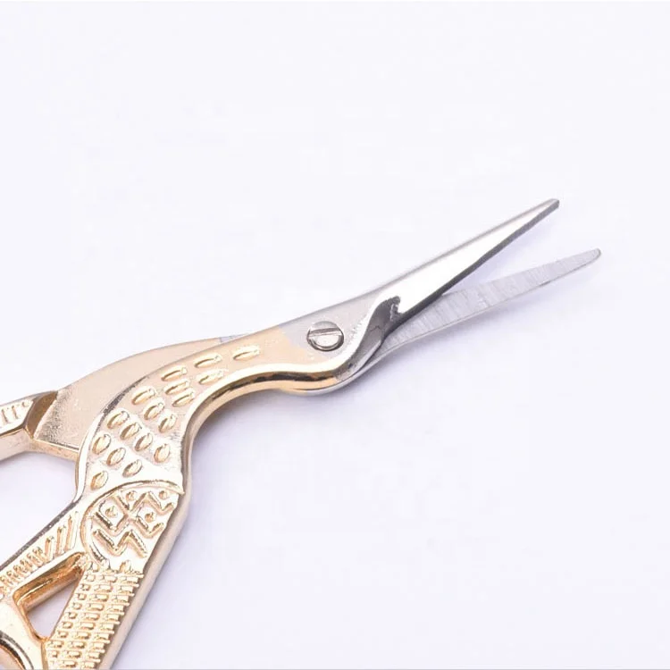 Golden plated small bird shape embroidery scissors