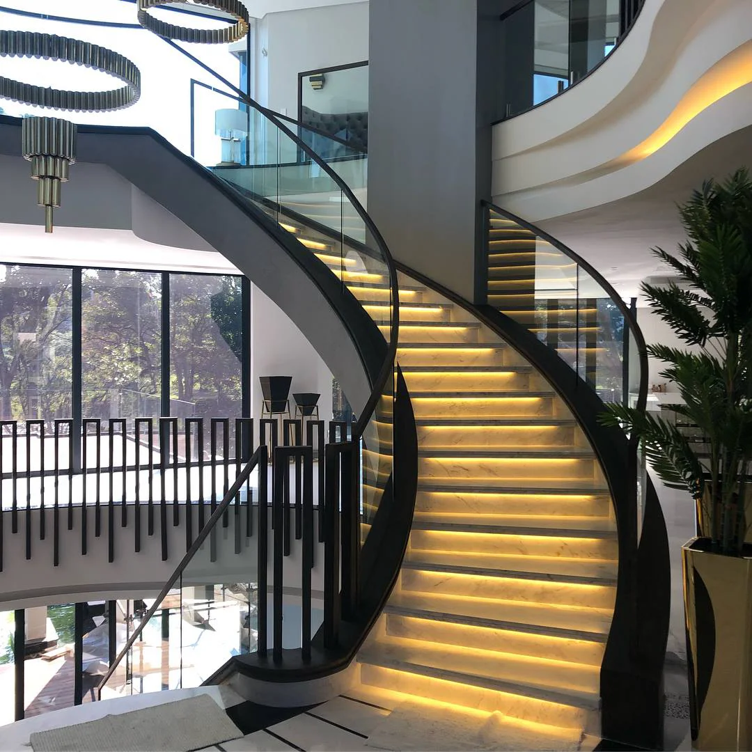 High Quality Modern Indoor Curved Staircase Interior ceramic stair step curved Stairs with Glass Railing stairs for small houses