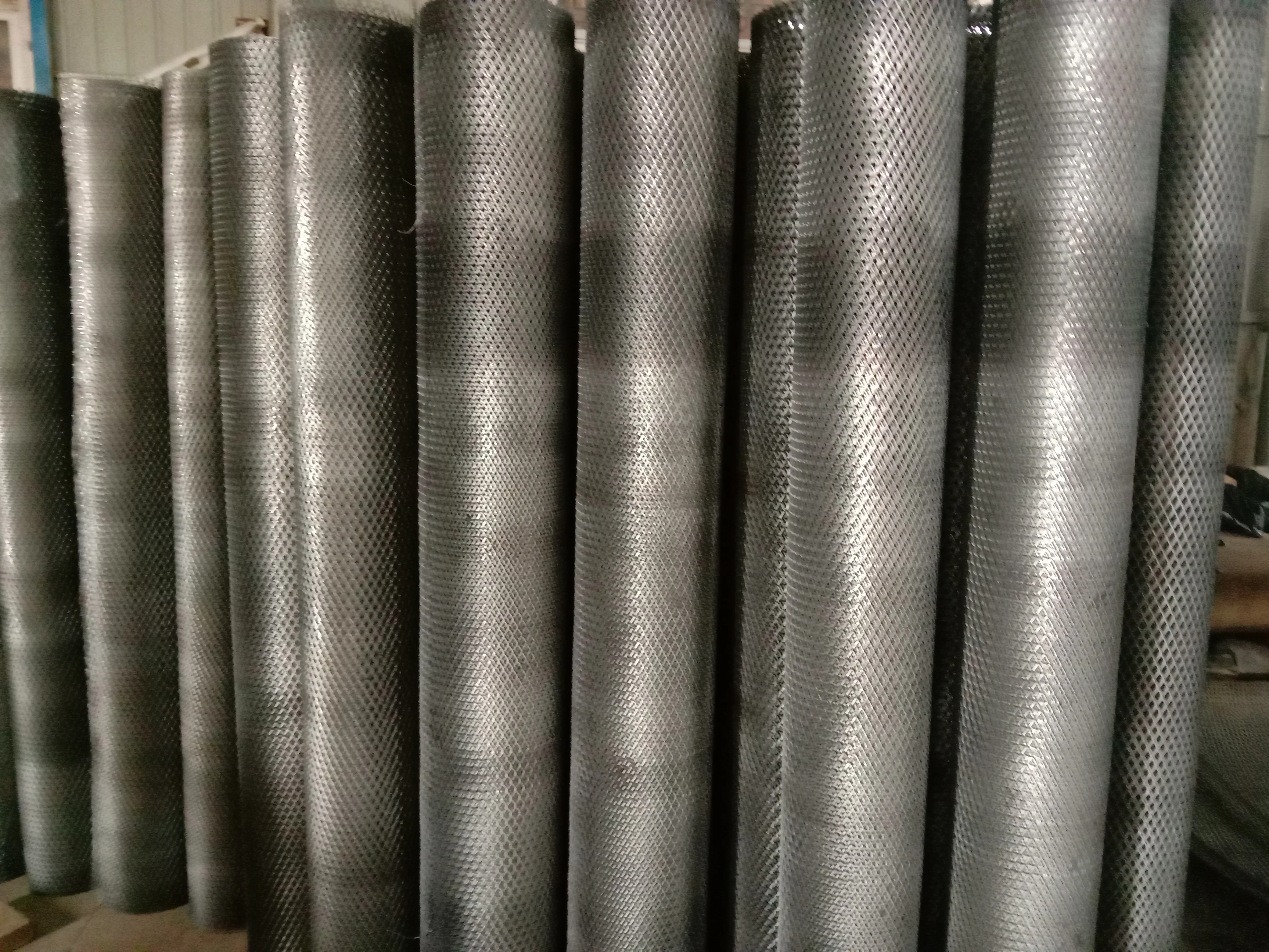 Perforated mesh for filter supporting mesh