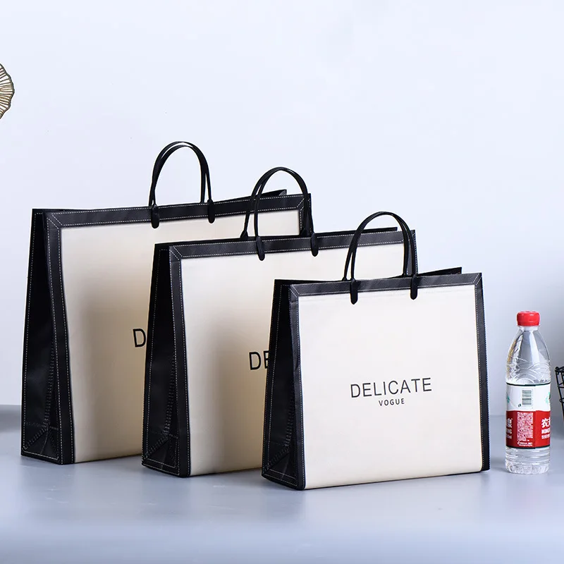 Hot Selling High Quality Customized Logo Non-Woven Portable Shopping Bag White with Striped Pattern for Clothing Packaging