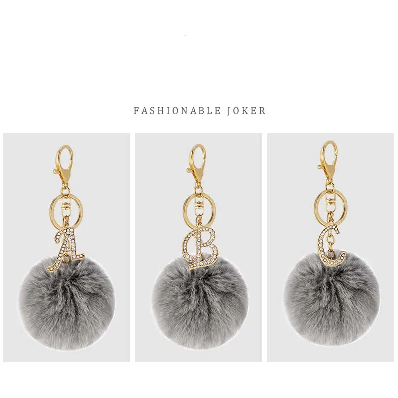 8cm popular new designs 26 English letters Keychain Faux Fur Pompon Keychain Women Rhinestone Leather faux Rabbit fur Ball