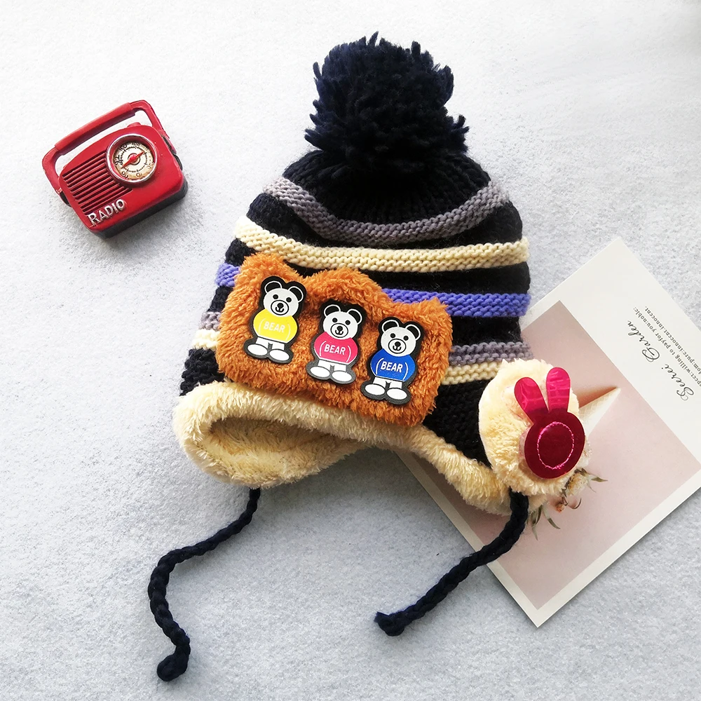 2022 Custom Cheap Baby Winter Hat Children Coral Fleece Lining Pom Pom Warm Beanie 100% Acrylic Unisex Cute Bear Cat Knitted Hat