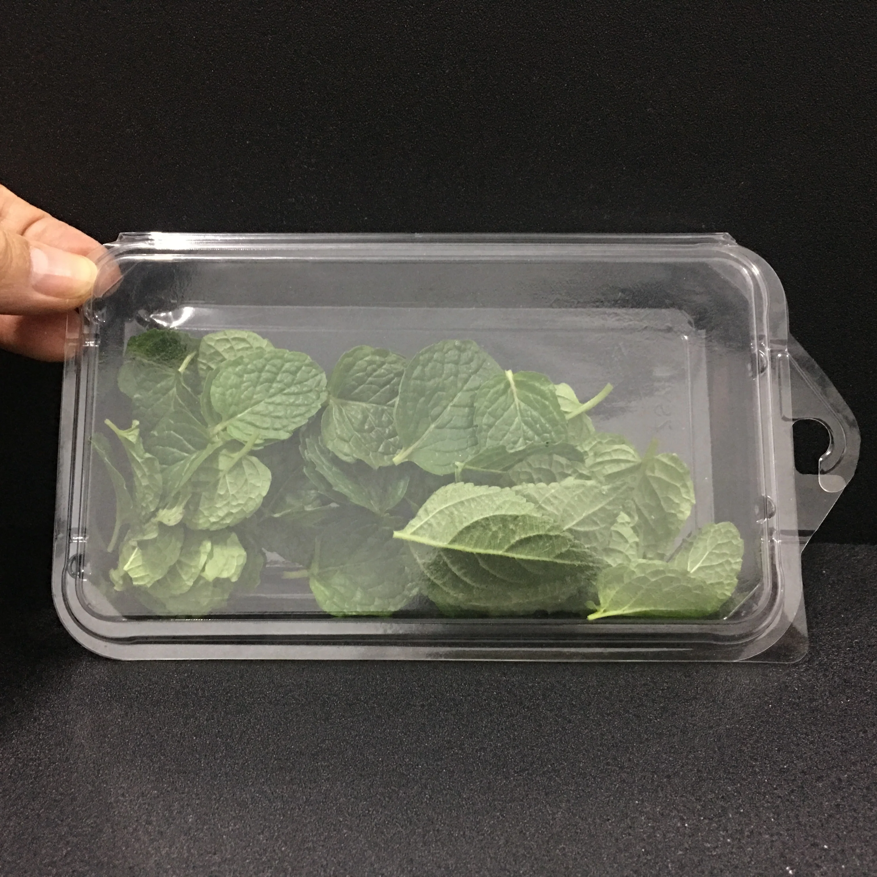 Disposable plastic herb packaging container with the function of tamper evident container for Basil leaves blister product