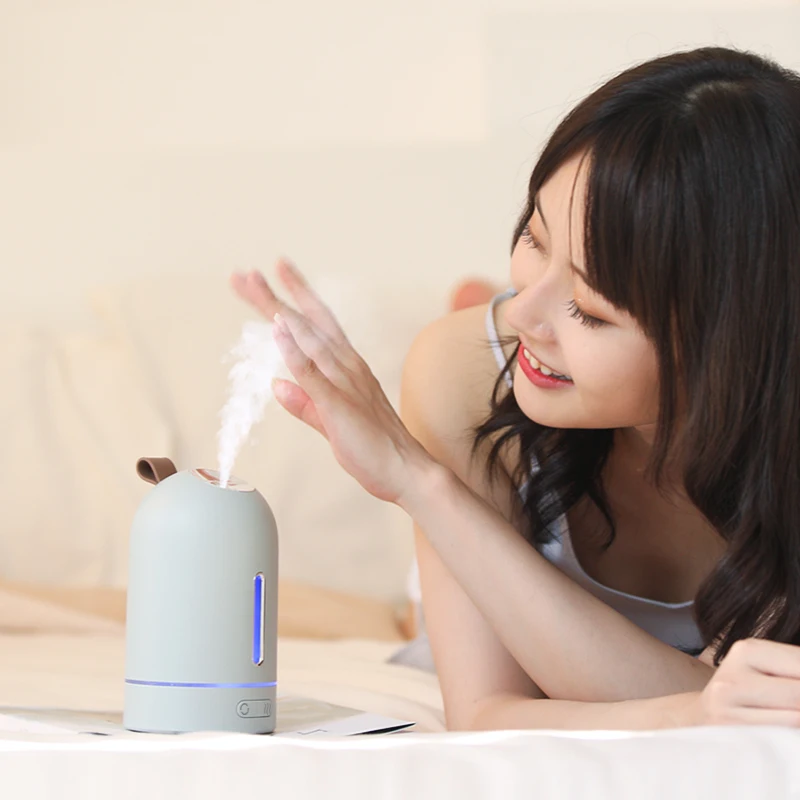 New design 260ml Cool Mist Personal Space 180 degree rotating Ultrasonic Mini Led Humidifier