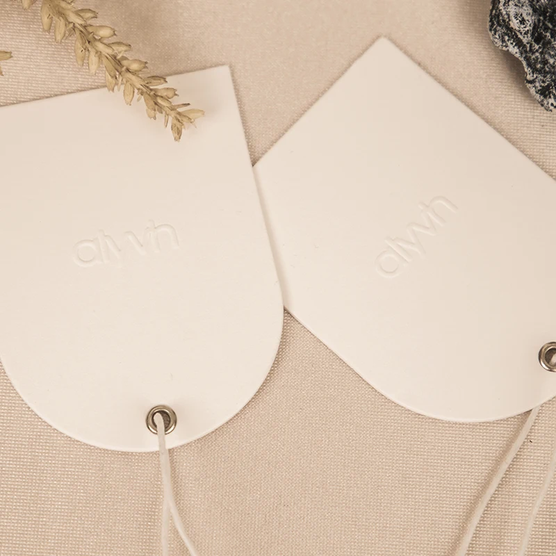 custom embossed logo metal eyelet hangtag paper swing tag arch shape tag with string