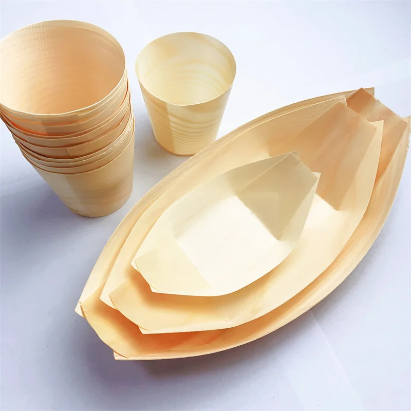 Eco-friendly disposable boat-shaped plates made from natural wood, safe and leak-proof.