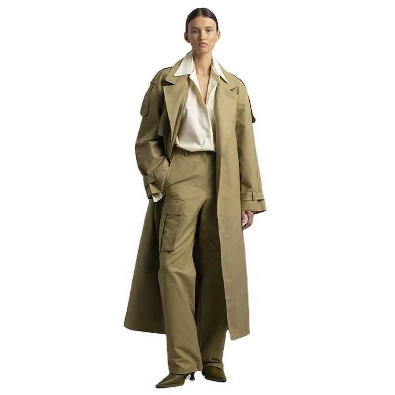 Khaki cotton trench Oversized silhouette Storm flaps Adjustable belted cuffs High vented back Front pockets trench coats women