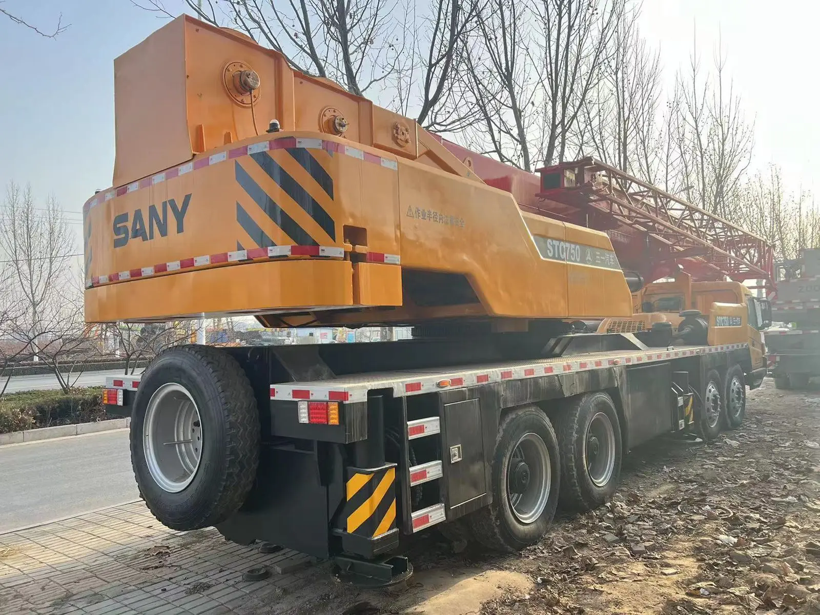 Дешевые SANY STC750 Подержанный автокран самосвал с установленными кранами