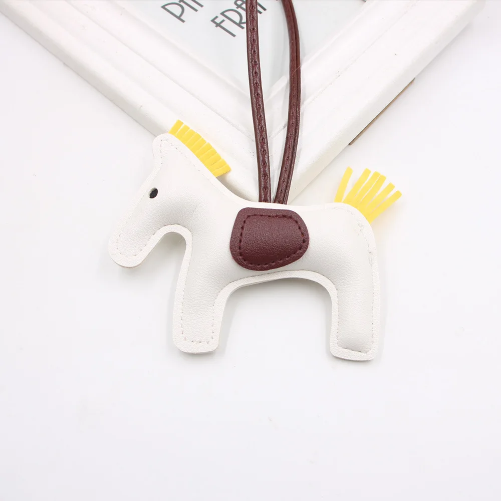 Hot selling cotton filled horse multi-color tassel pendant PU leather keychain hanging rope horse cute fashion bag accessories