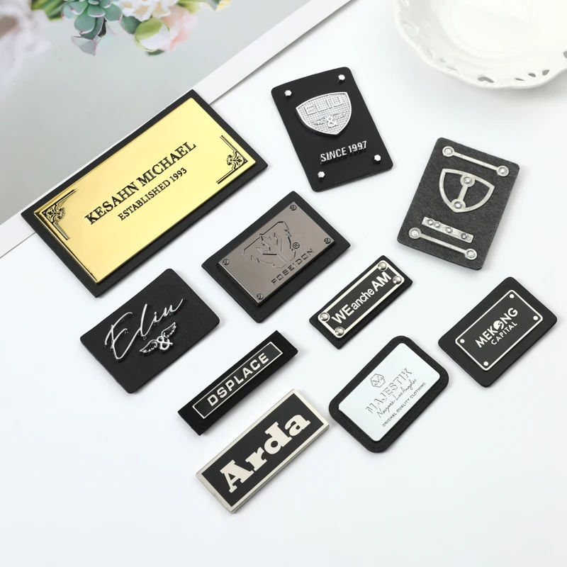 2024 good supplier metal logo labels with leather sewing label For Clothing Garment Metal Accessories