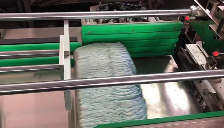 30 60 pieces per bag semi automatic baby diaper sealing machine 8 12 bags per minute for baby diaper packing