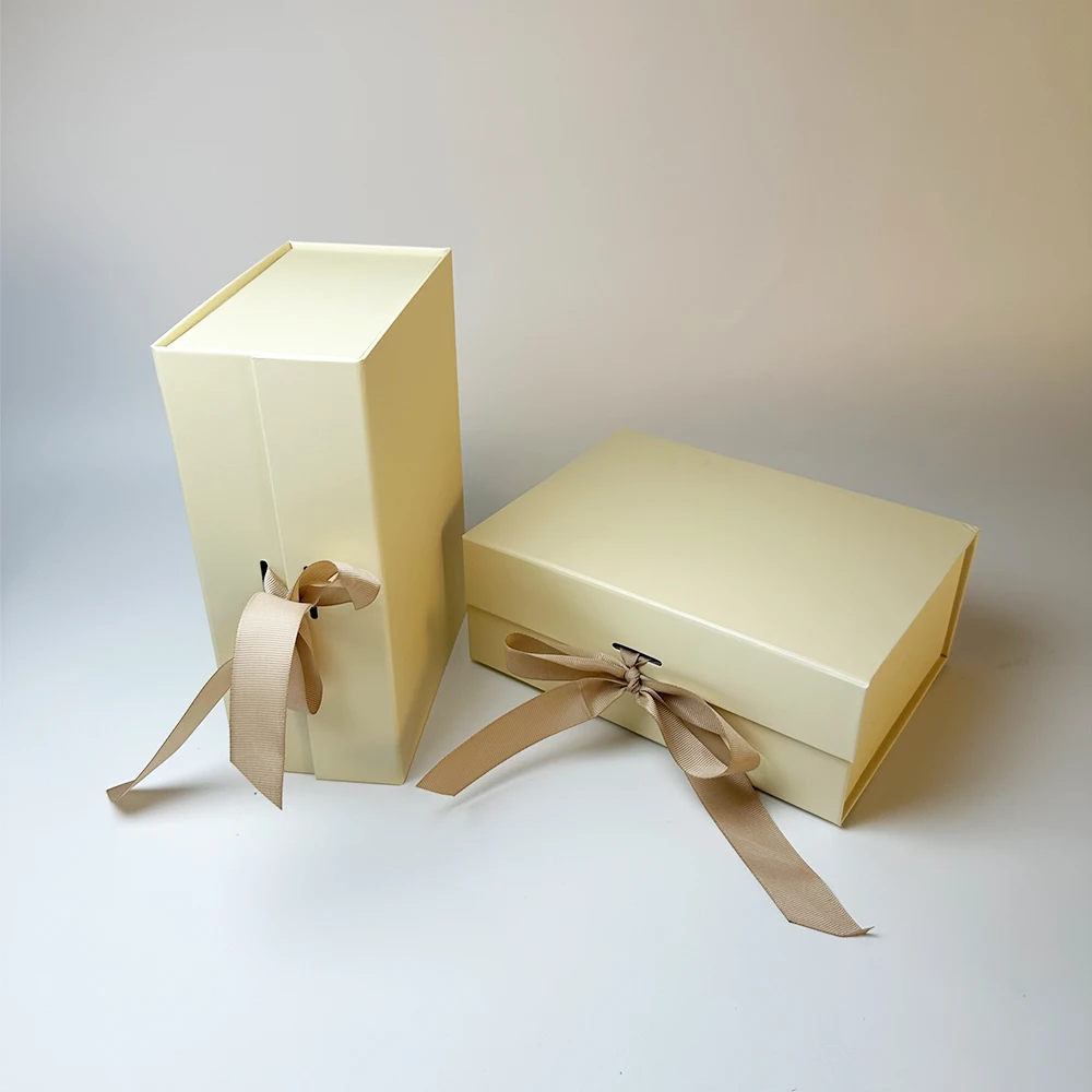 Hot Selling Creative Flap Gift Boxes Magnetic Folding Packaging Boxes UV Bump Design Customized Gift box with Ribbon
