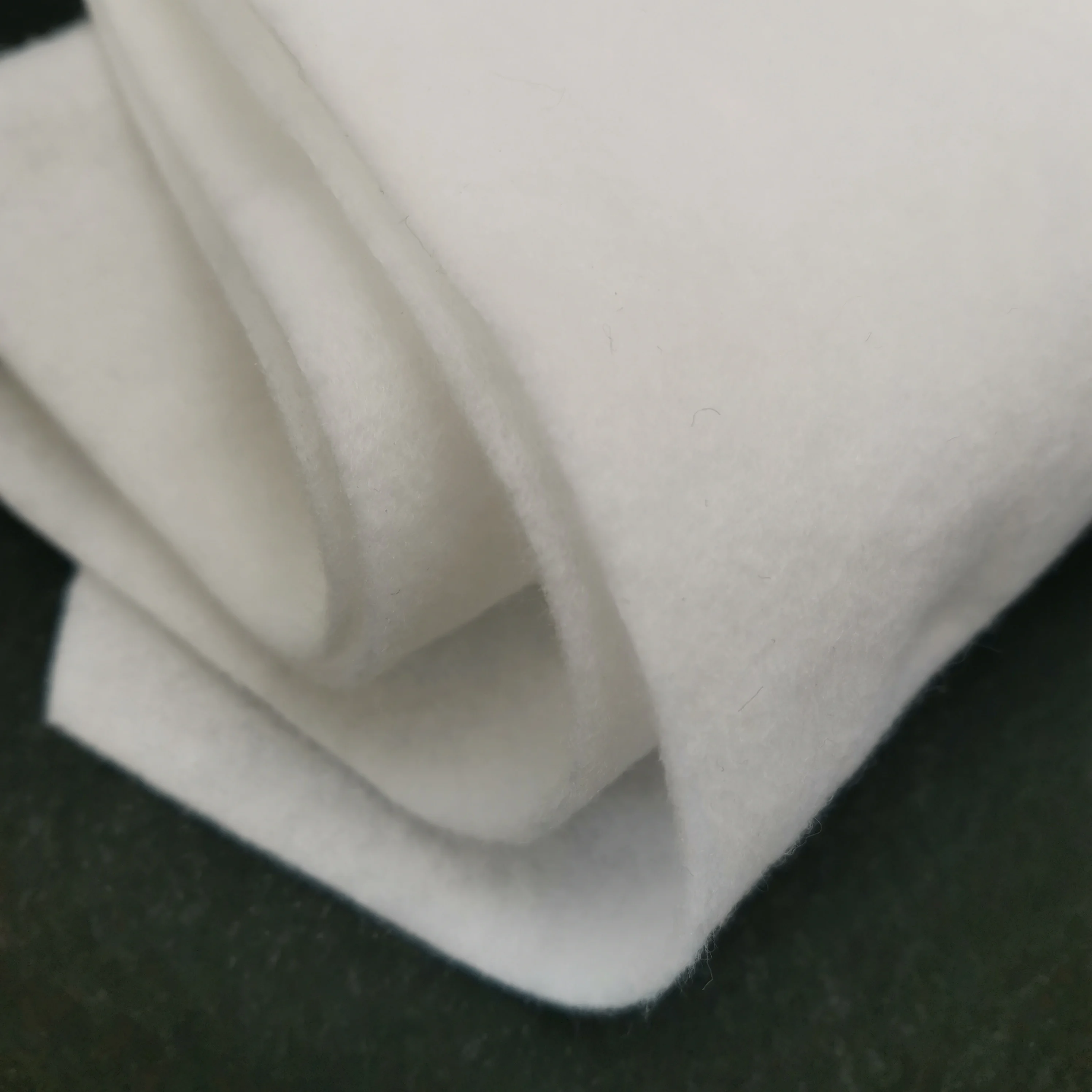 Adhesive Patchwork Polyester Fabric Adhesive Needle Punched Nonwoven Interlining Filler Material for Bag Sewing