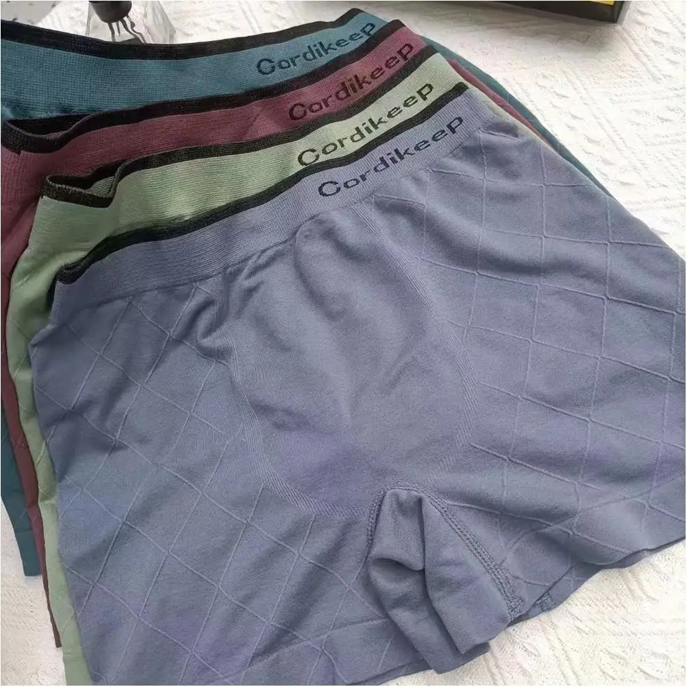 Mens Sexy Underwear Ball Pouch Ice Silk Wholesale Bikini Hot Sale Boy Photos Popular Polyester Thong Brief for Man Shipping Free