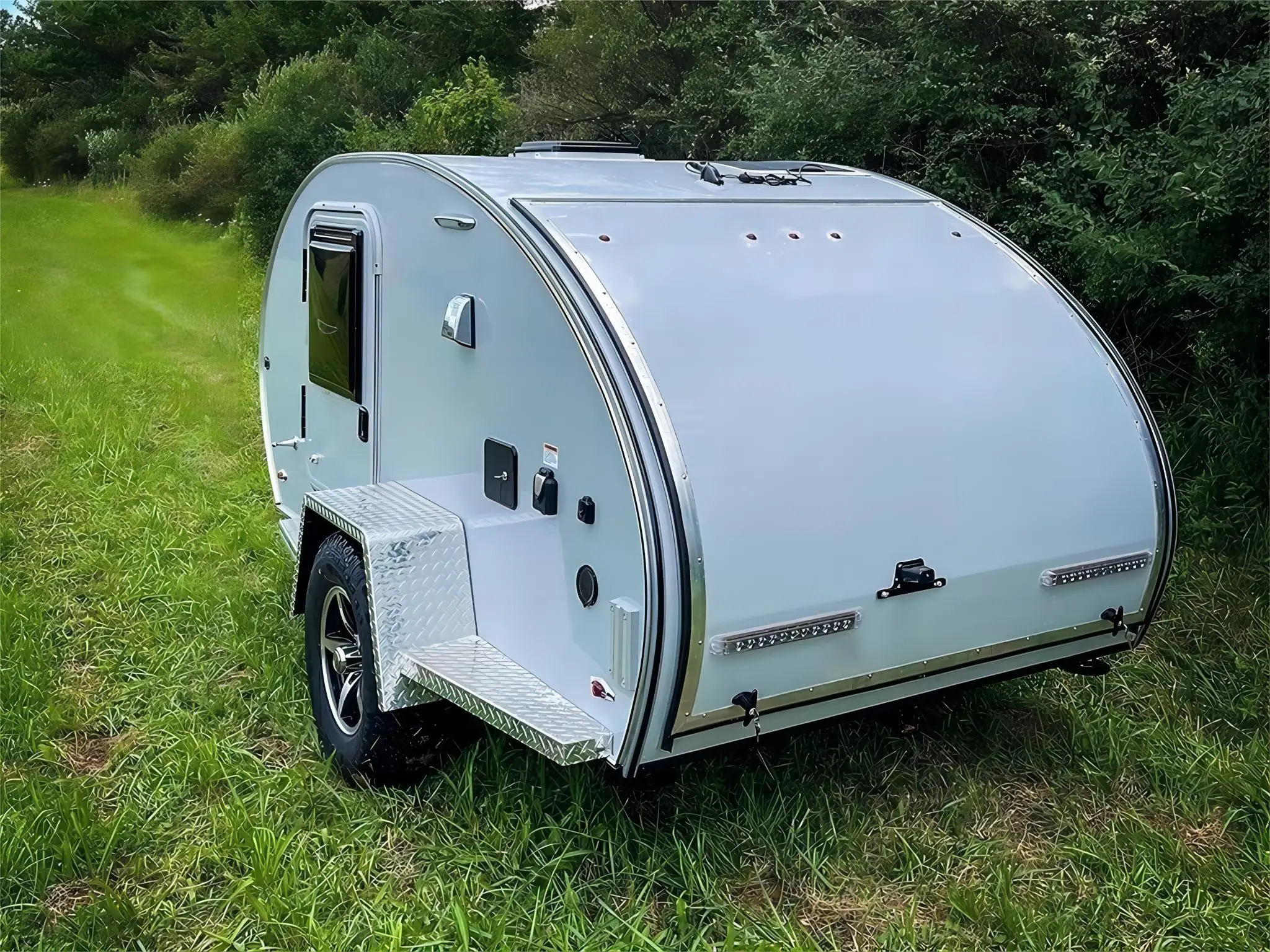 Small Teardrop RV Trailer Camper with Portable Solar Panel and Refrigerator Options