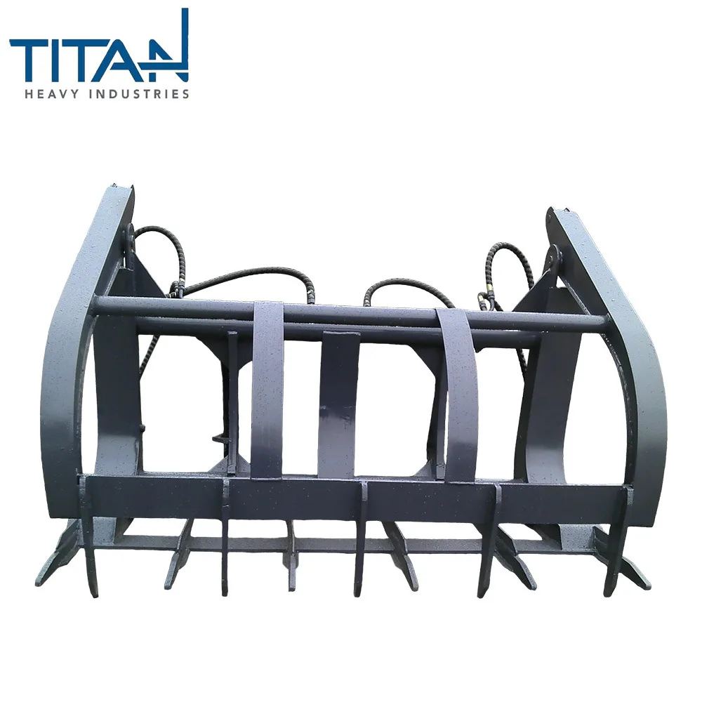 Loader attachments can be customized including a trailer fork a hydraulic wood grab fork  European-style quick hitch