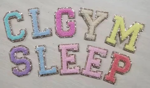 Embroidered letters with gold glitter background in variety chenille colors for bags and clothes