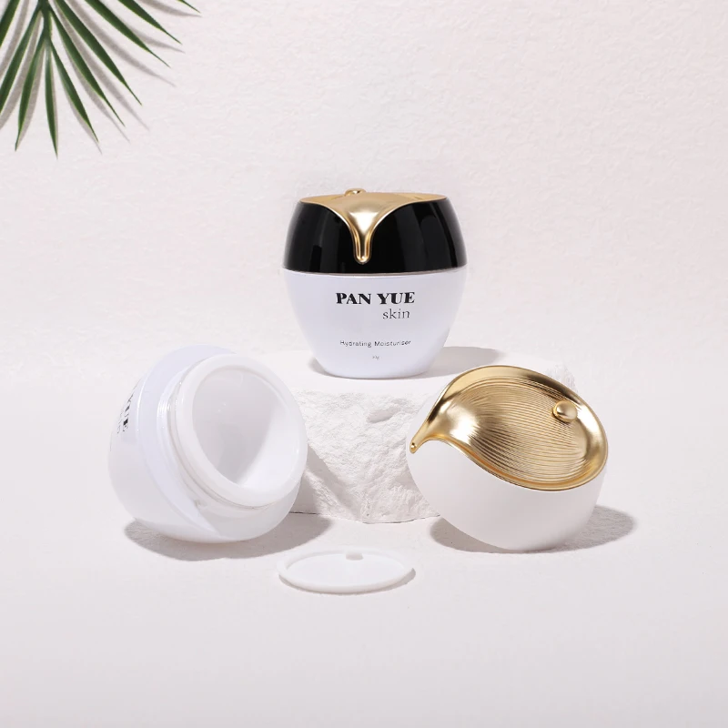 The latest lotus shaped empty glass bottle set with plastic plating lid for cosmetics skincare packaging wholesales