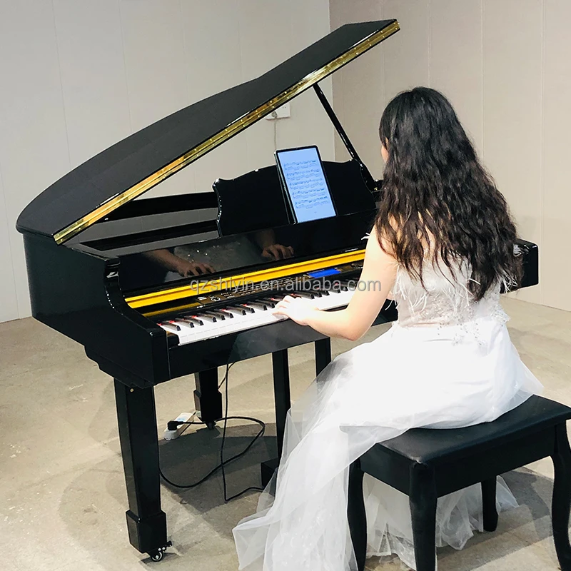 electric grand piano for sale black and white polish piano