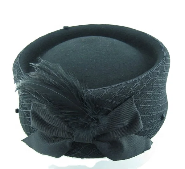 Black wool felt ladies pillbox hat with feathers