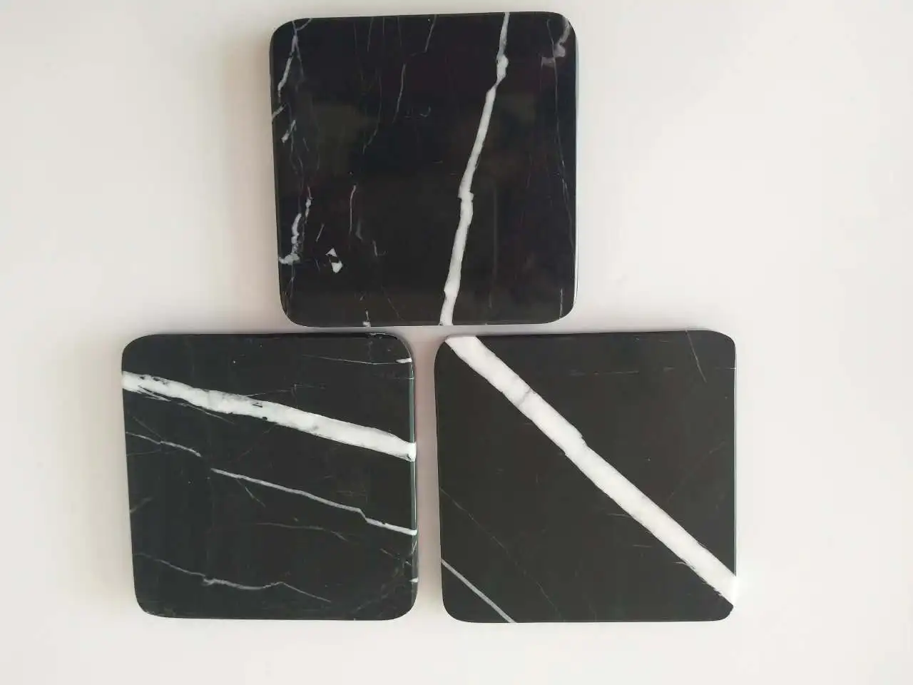 Polished hexagon shape black marquina marble coasters wholesale