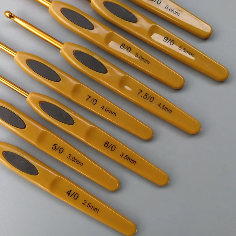
8pcs crochet needle set orange plastic metal durable practical crochet hook knitting needle set 