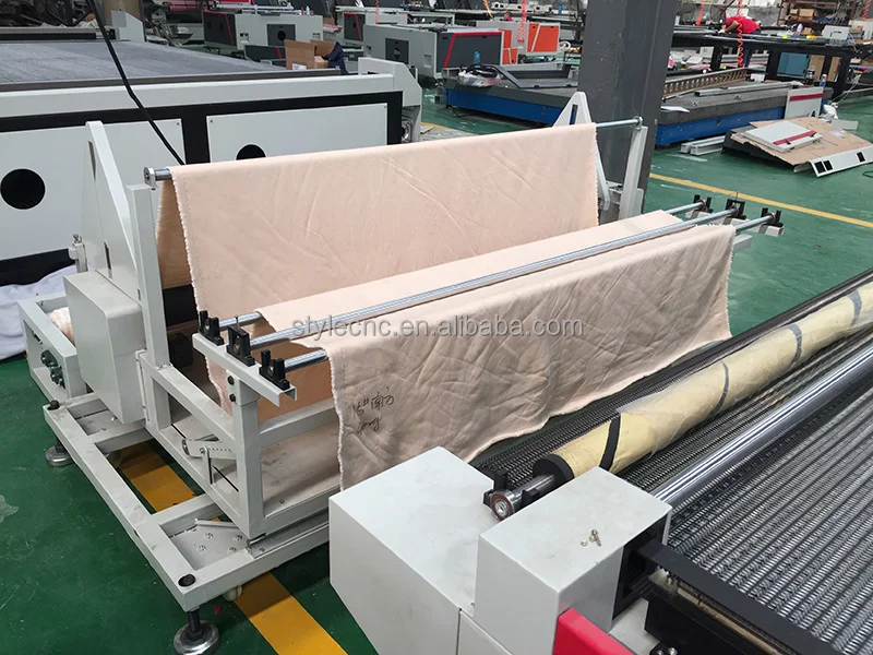 Industrial Laser Fabric Cutting Machine with large conveyor table and automatic feeding system