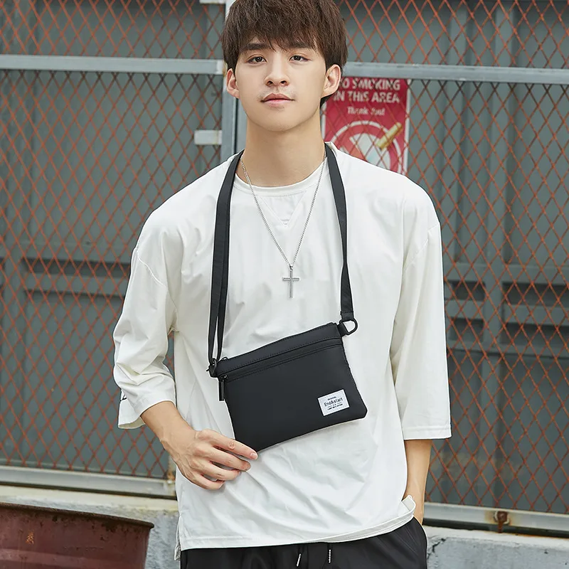 2022 New trendy sling small shoulder bags wholesales simple man cross body purse custom logo mini nylon crossbody bag for men