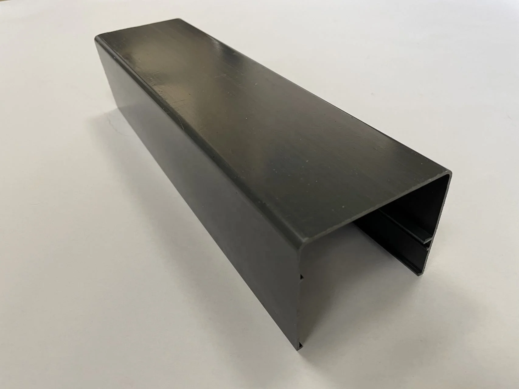 Plastic U shaped extrusion decorated profile for edge trimming