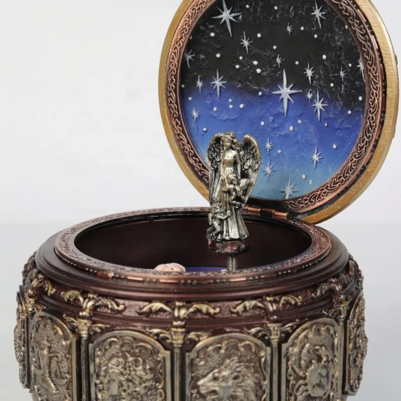 Lighting and rotation battery operated music box