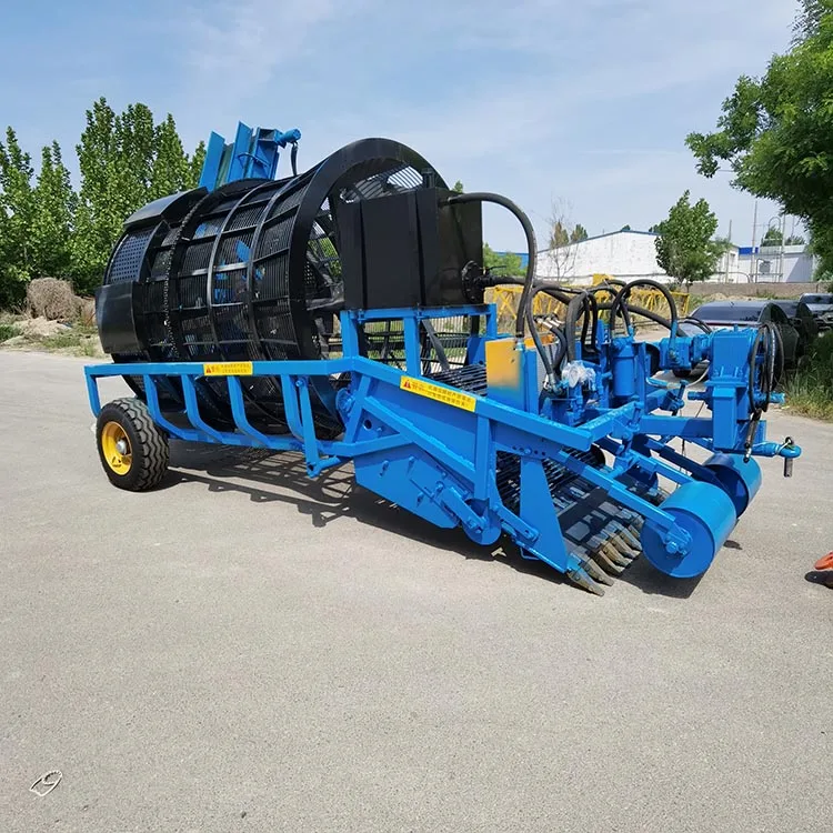 Large stone picker machine collect and recycle debris and clear land and open up wasteland