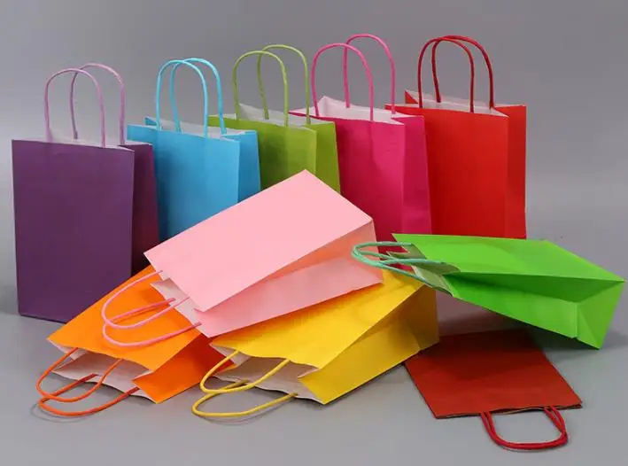 Wholesale cheap boutique reusable kraft paper bag with handle