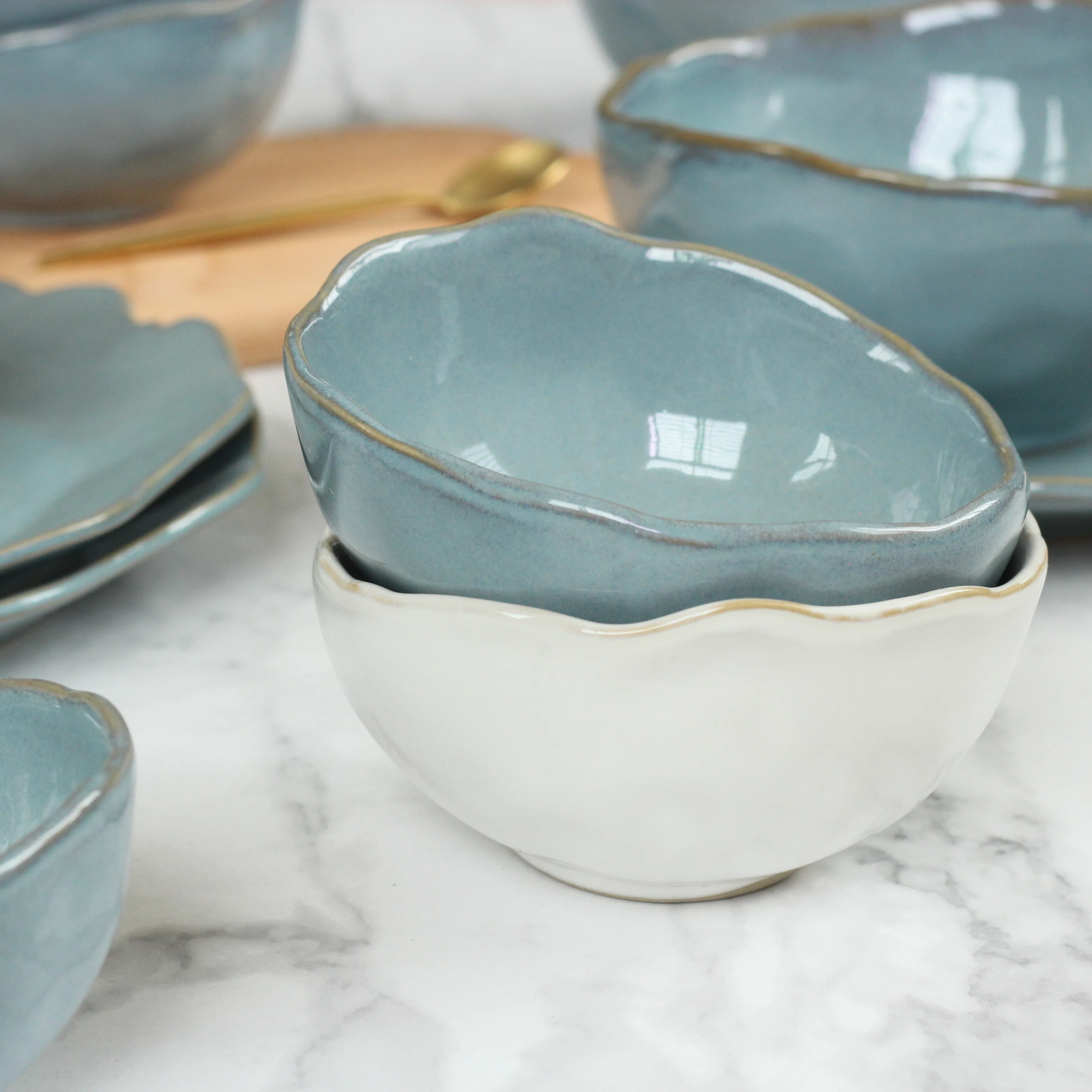 Irregular shape ceramic tableware set with elegant gloss blue reactive glaze for wholesale