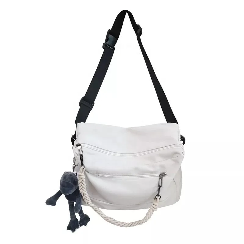 New Comfortable Eco Friendly Front Pocket shoulder cotton canvas tote with Long adjustable Straps and a cute doll