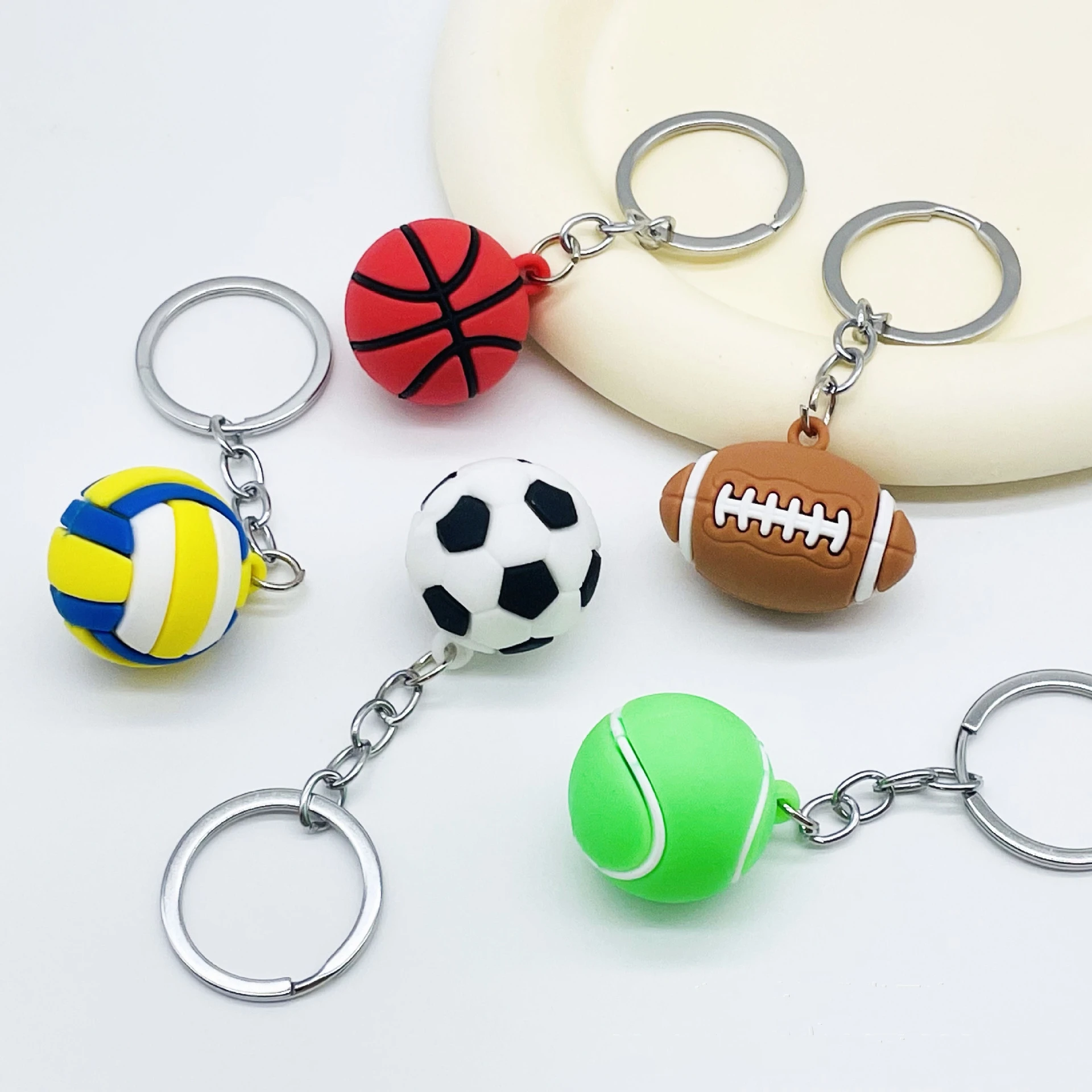 Creative 3D simulation soft rubber football basketball keychain, rugby tennis keychain, sports equipment keychain