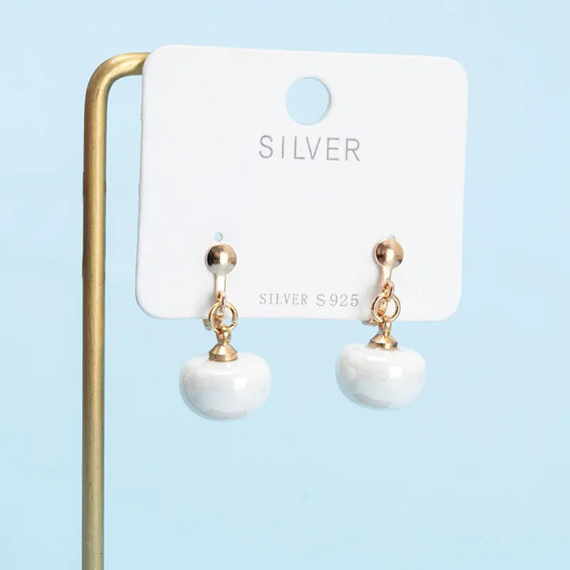 Wholesale delicate fashion open and close gold plated perforated copper earrings, white K, KC gold hollow triangle earrings