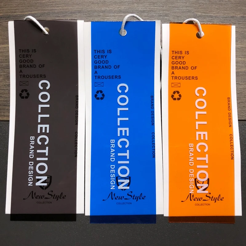 
Custom tags designer orange PVC paper hangtag with string loop 