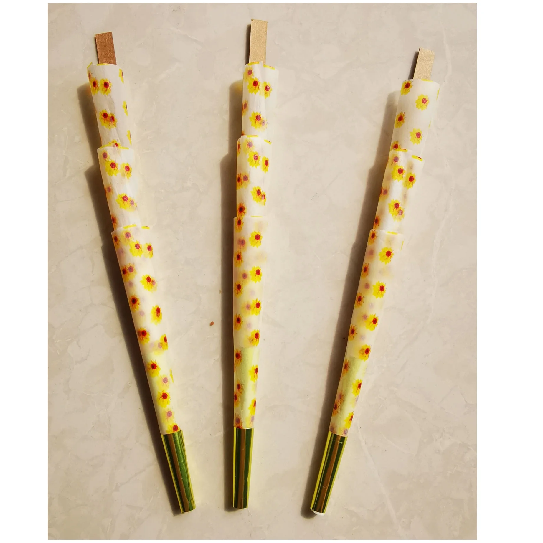 
24k gold paper prerolled rolling cones making 