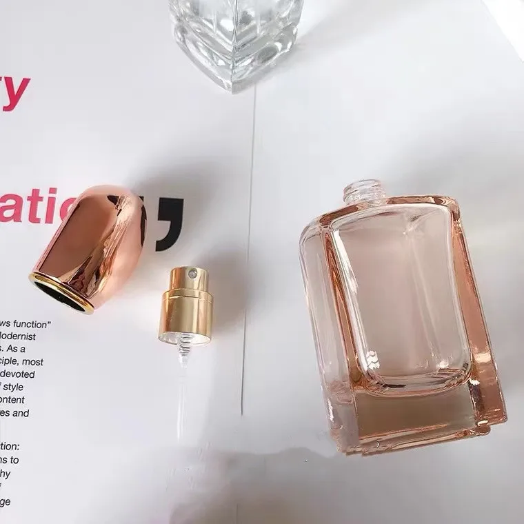 LOW MOQ Rectangle 30ML/50ML thick bottom orange colored perfume bottle with fancy lid